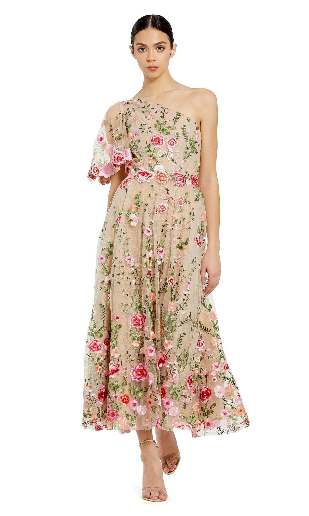 A woman faces forward wearing the Mac Duggal 68607 one-shoulder midi party dress in beige, adorned with pink and red floral embroidery and featuring a graceful tea-length silhouette.